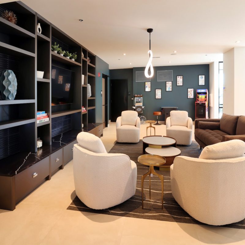 Professional conference room with modern table and seating at Station 250 business center amenities Mundelein IL