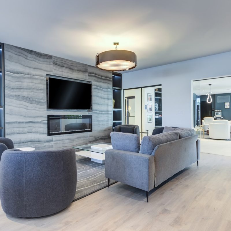 Station 250 modern seating area with blue upholstered furniture and contemporary interior design Mundelein IL